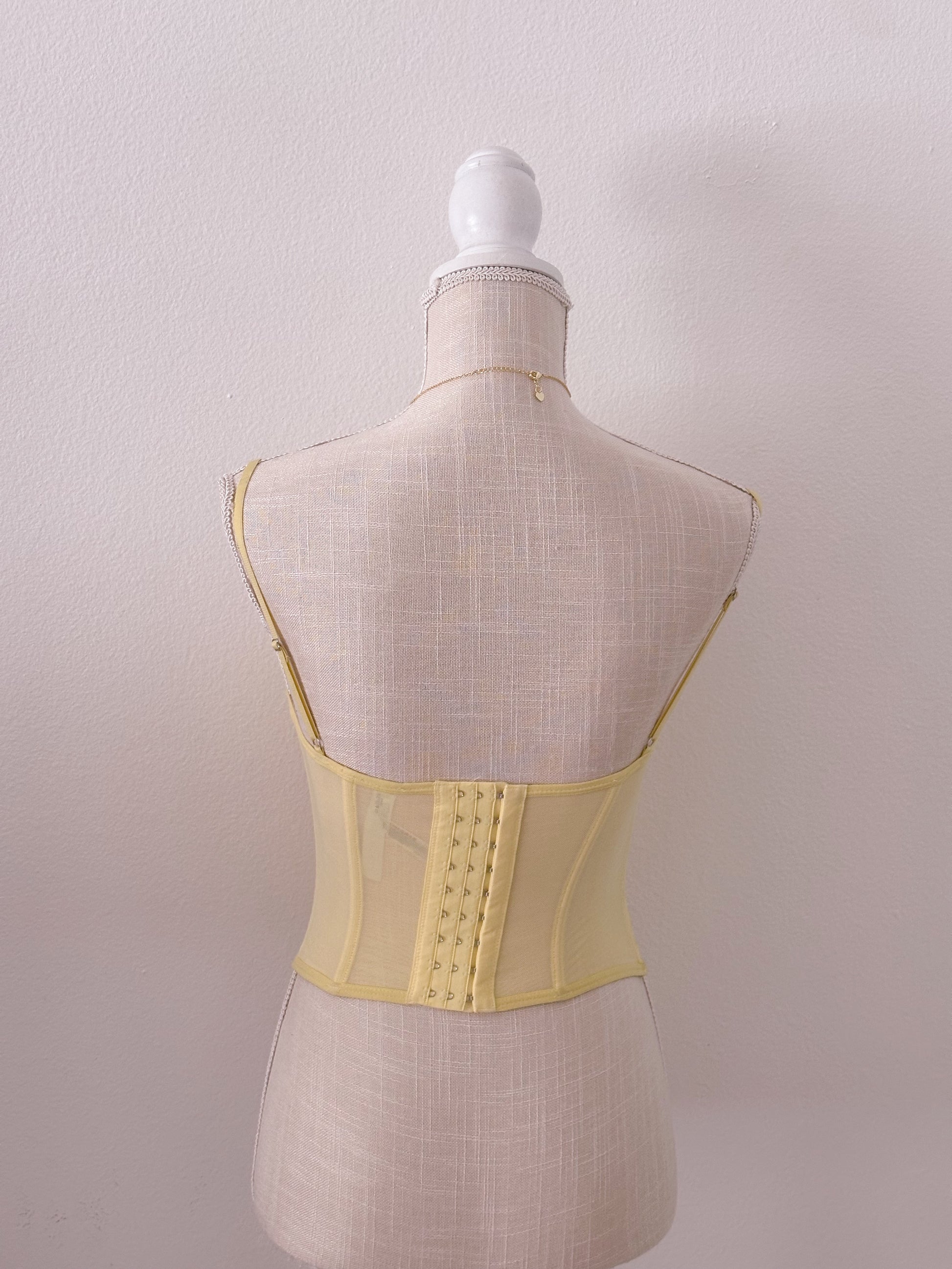 Urban Outfitters yellow Corset top size: S